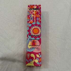 amika heat defense serum - pink, teal & yellow patterned box